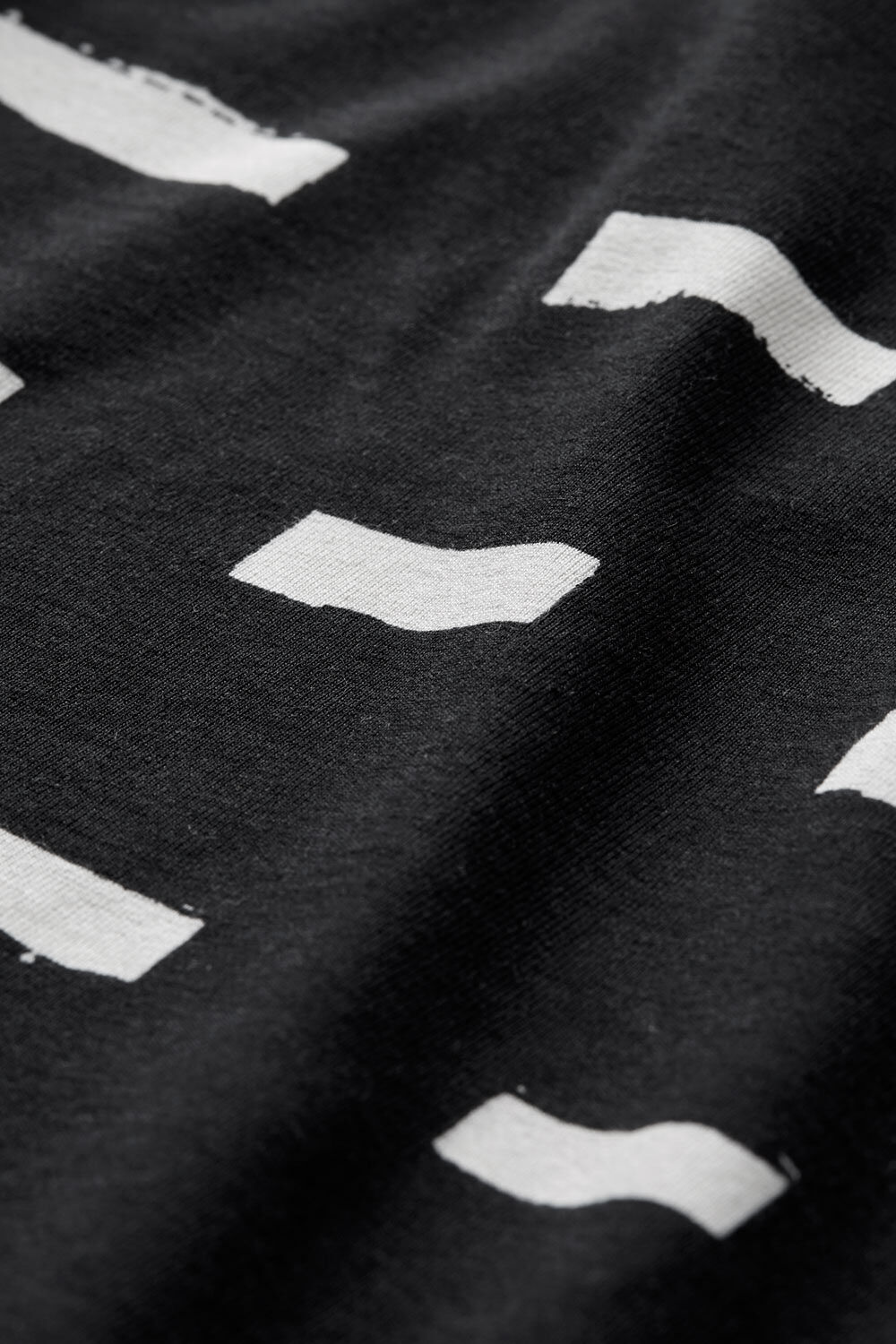 &Auml;rmelloses Top aus bedrucktem Jersey, Black