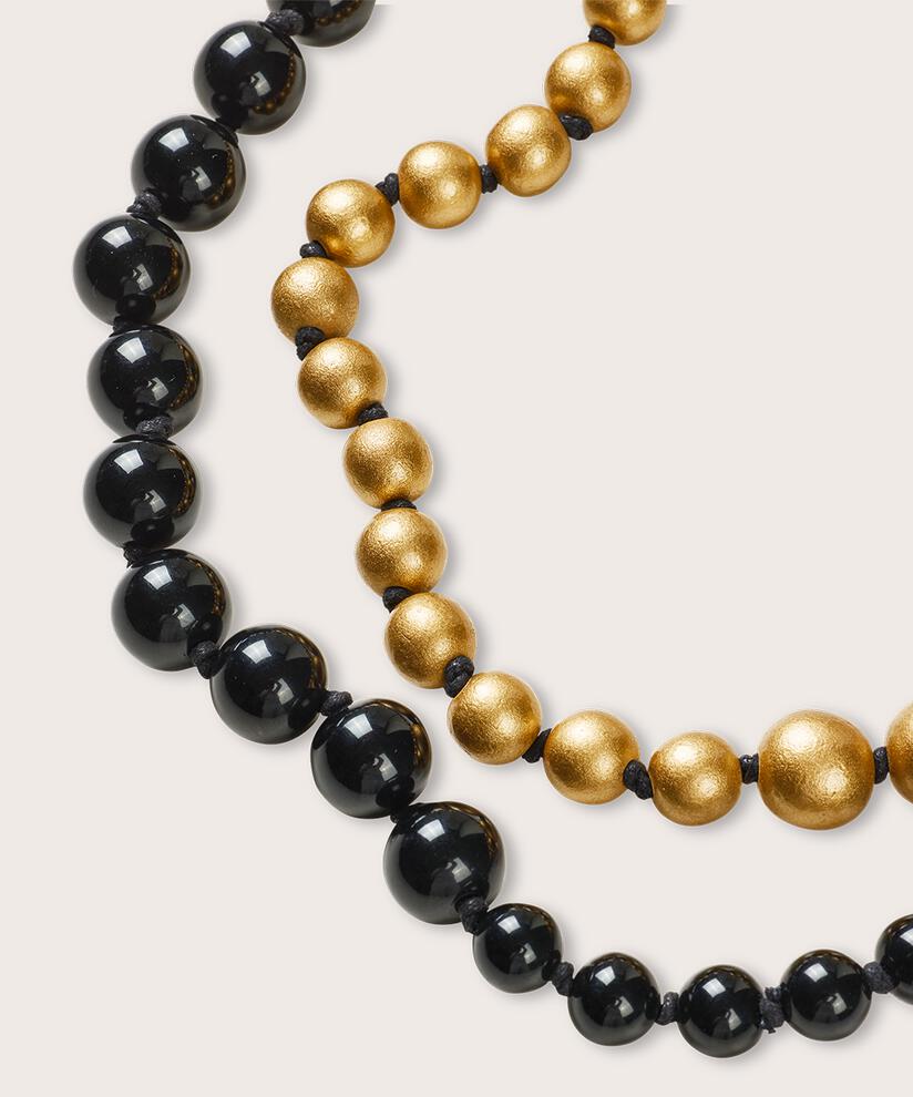 Lange Kette mit schwarzen und goldenen Perlen, Gold