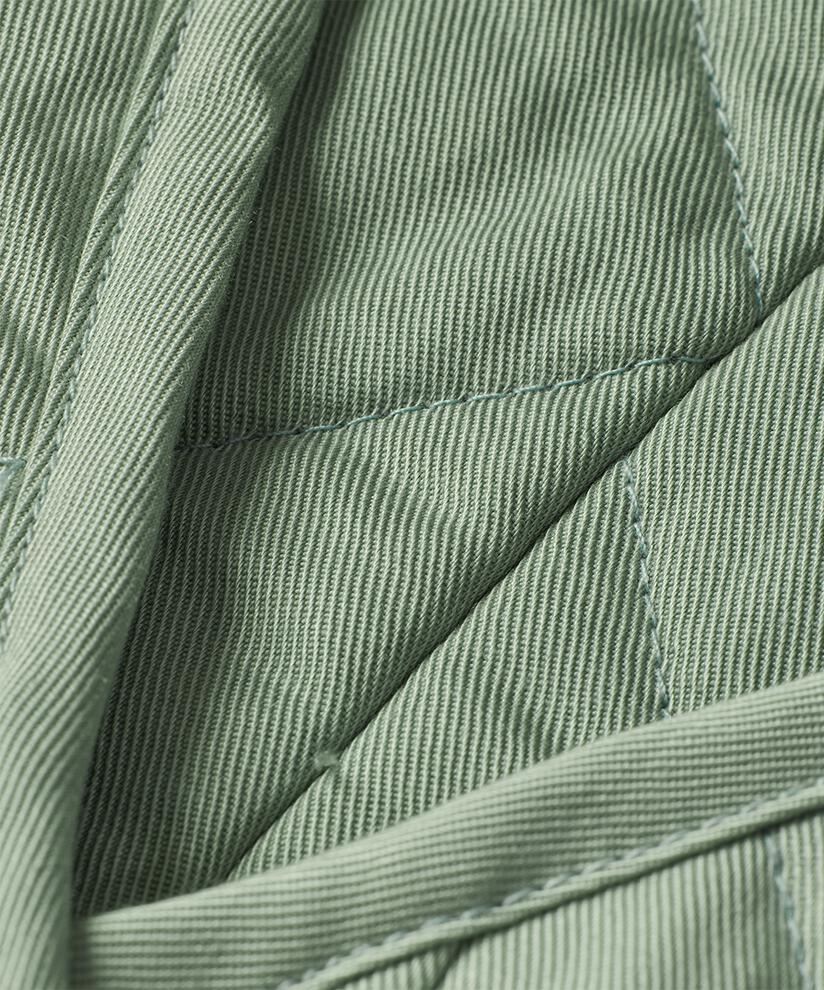 Steppweste mit Paspeldetails, Frosty Green